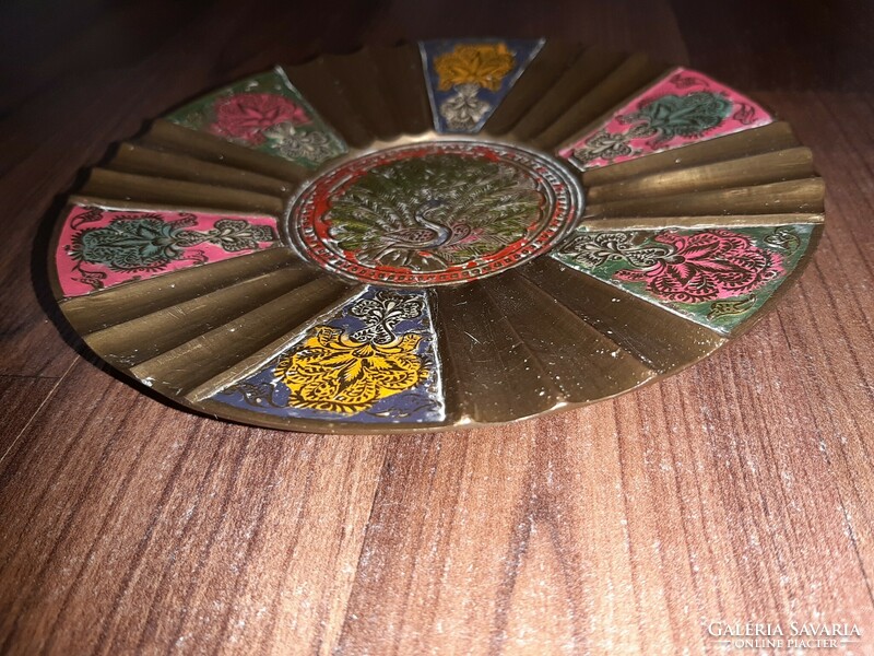 Copper bowl with peacock motif