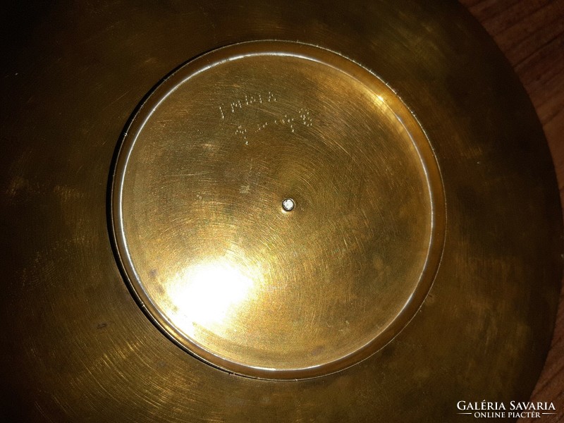 Copper bowl with peacock motif