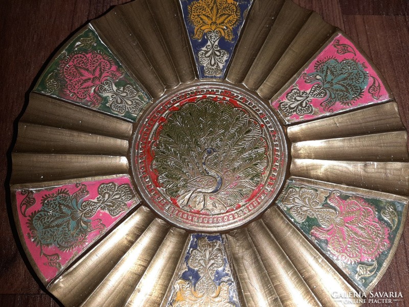 Copper bowl with peacock motif