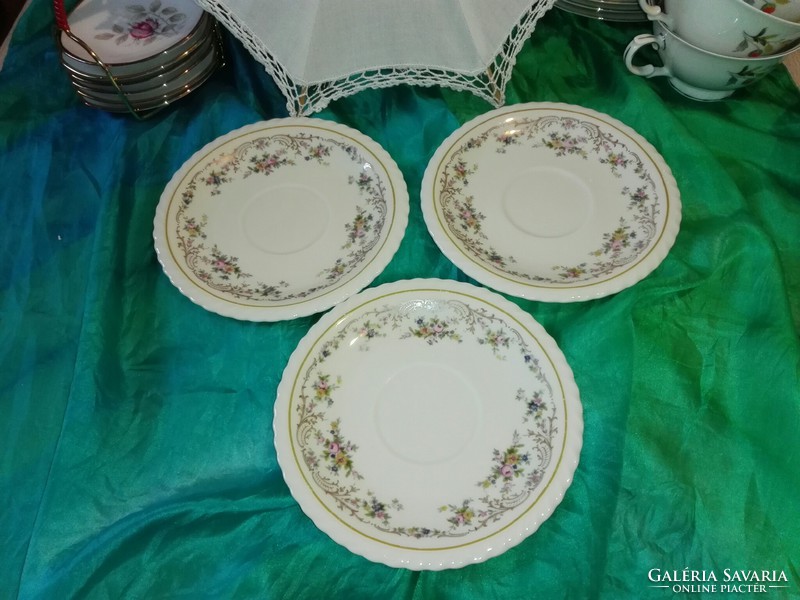 Richly patterned cookie plates...Butter color base.