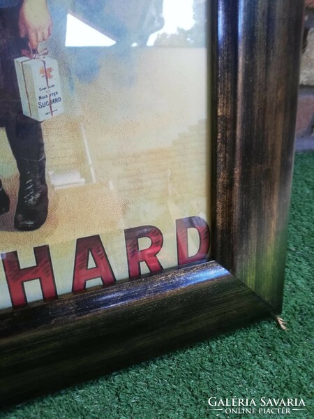 Chocolate advertising in a glazed wooden frame