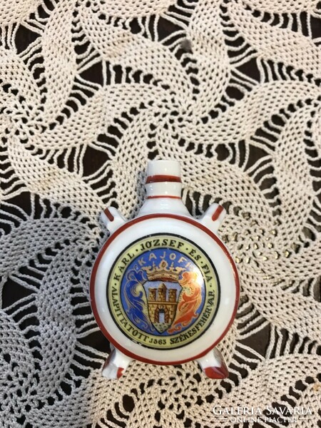 Zsolnay porcelain water bottle with small damage, shield seal mark.
