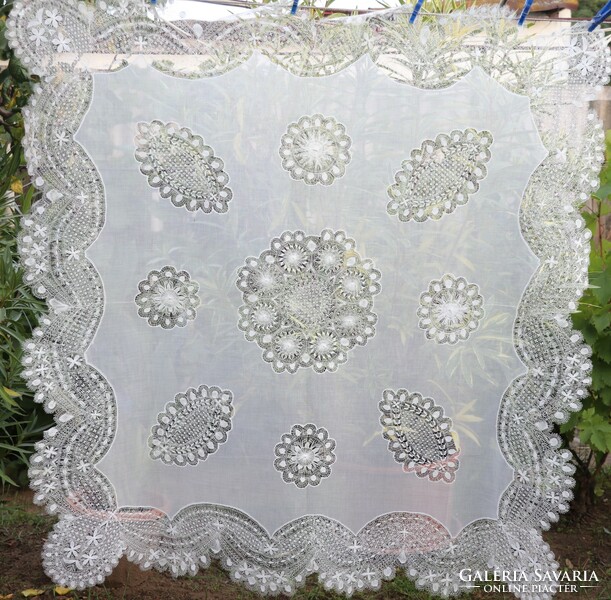 Tablecloth with a green lace insert