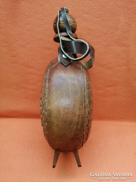 Marked, numbered, hand carved. Traditional wooden water bottle.