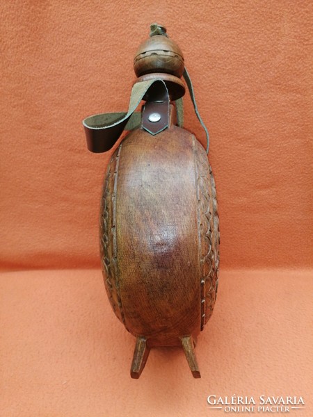 Marked, numbered, hand carved. Traditional wooden water bottle.