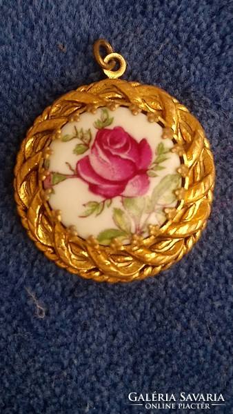 Vintage porcelain pendant in the shape of a painted rose in a beautiful gilded frame