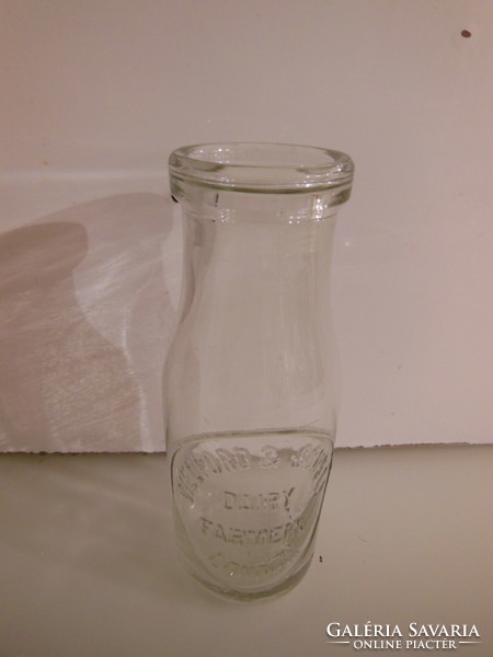 Milk bottle - old - English - embossed - 3 dl - 16 x 6 cm - flawless