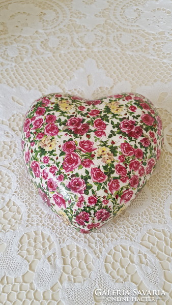 Pink, heart-shaped ceramic garden or table decoration