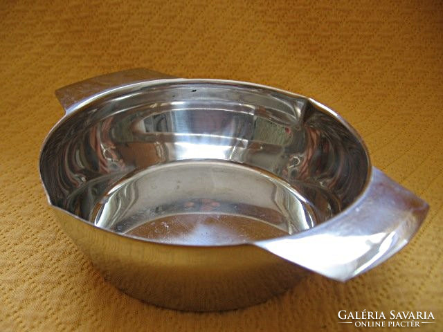 Stainless steel bowl with sauce