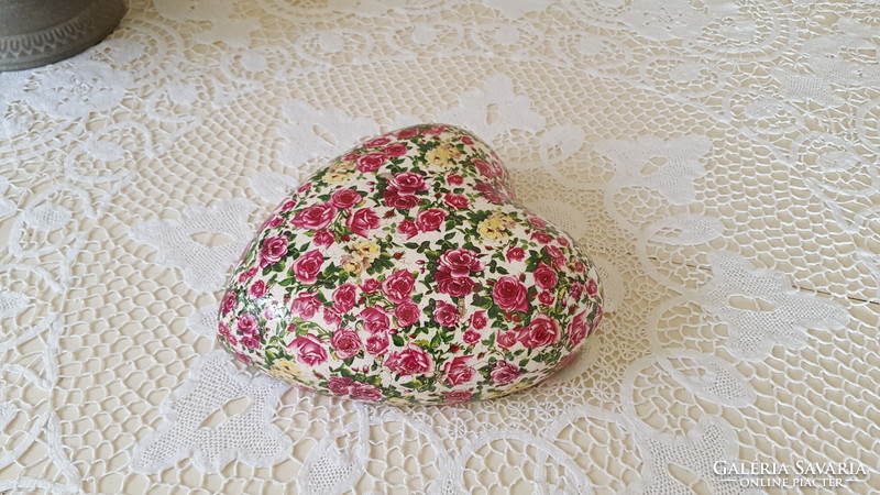 Pink, heart-shaped ceramic garden or table decoration