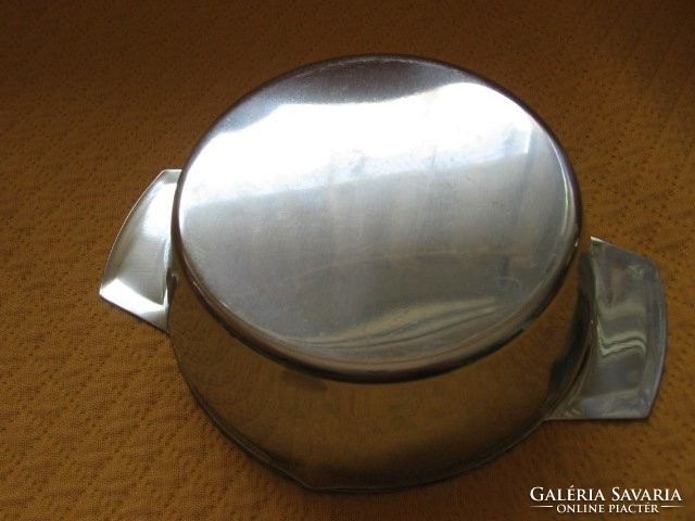 Stainless steel bowl with sauce