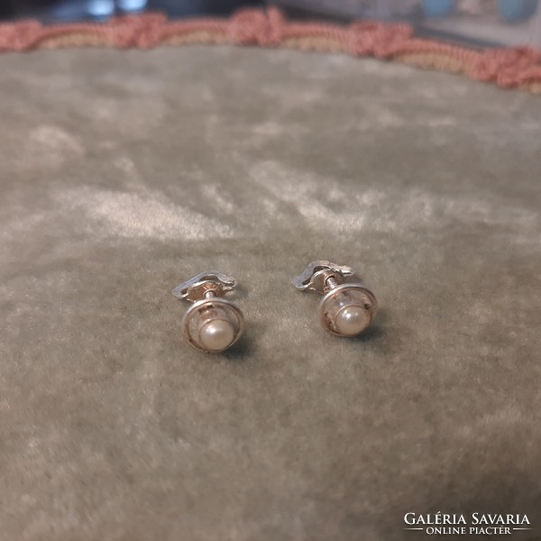 A pair of silver beaded coil earrings