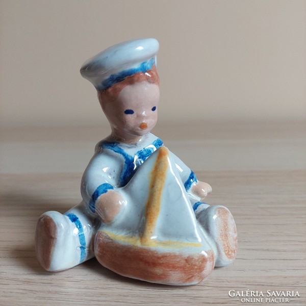 Mid century sailor boy with sailing ship ceramic figure