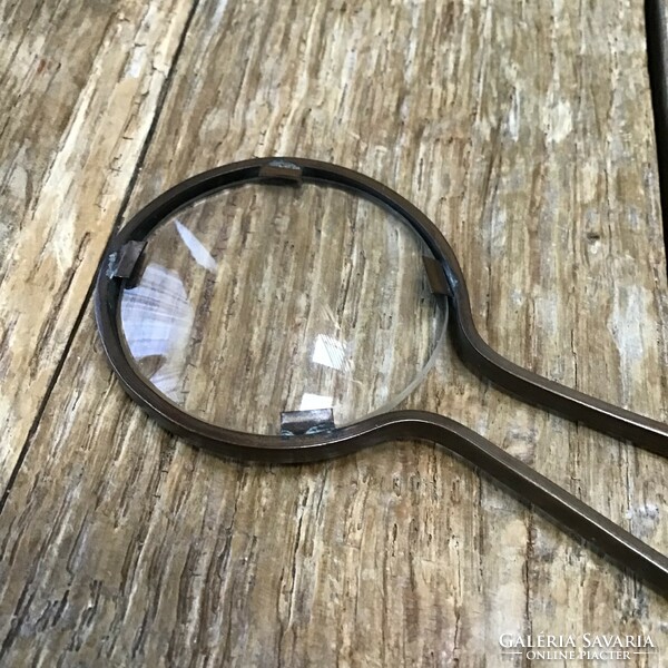 Old magnifier with copper handle