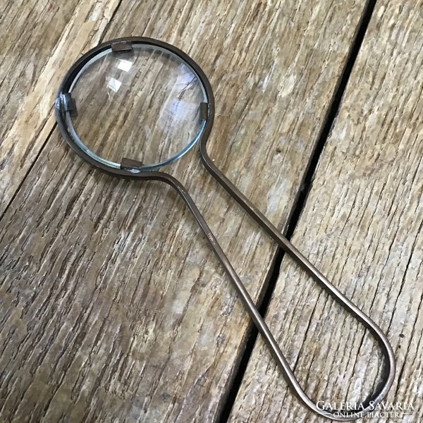 Old magnifier with copper handle