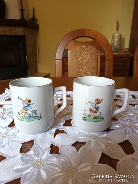 Pair of old Zsolnay children's mugs with fairy tale patterns