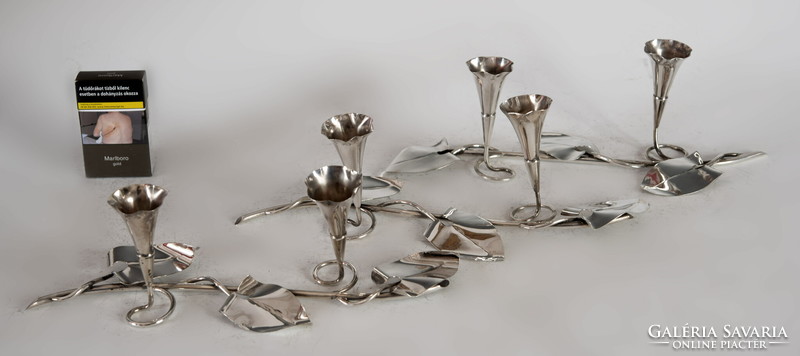 Silver stylized flower garland candle holder