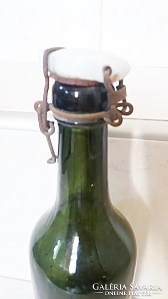 Old bottle circa 1930 with bless mineral water inscription on buckle bottle