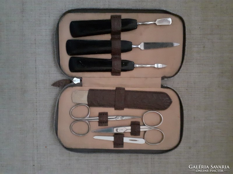 Old marked /germany/ travel manicure set with small mirror in case