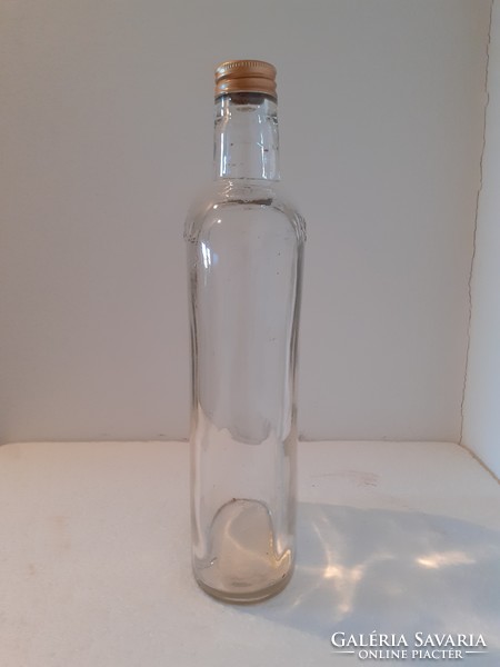 Liquor bottle with old bottle of meinl inscription