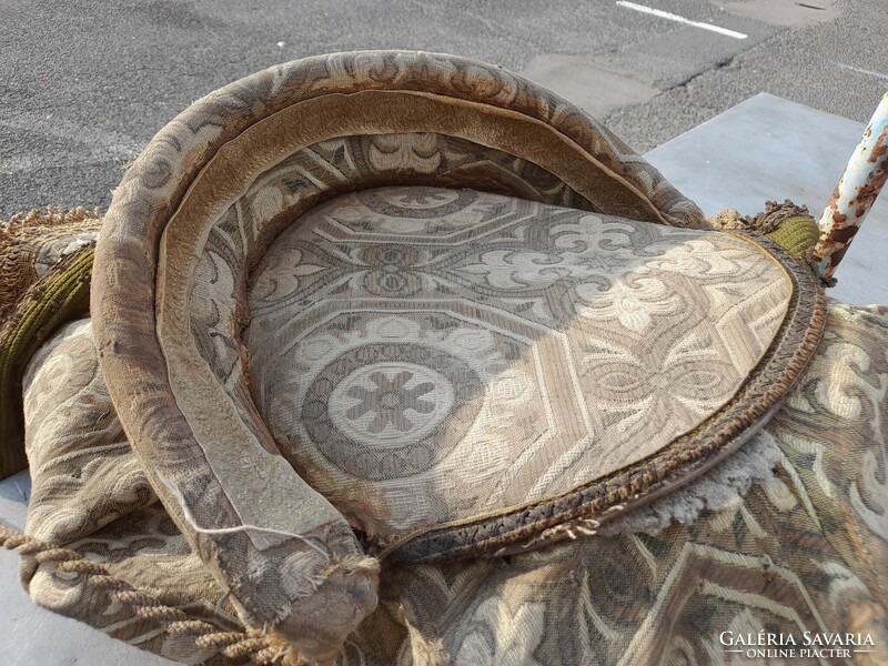 Saddle decorated with old fabric. Eastern?