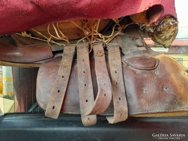 Saddle decorated with old fabric. Eastern?