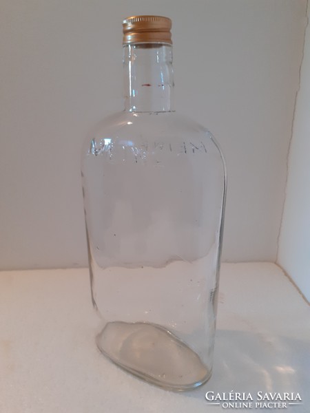Liquor bottle with old bottle of meinl inscription