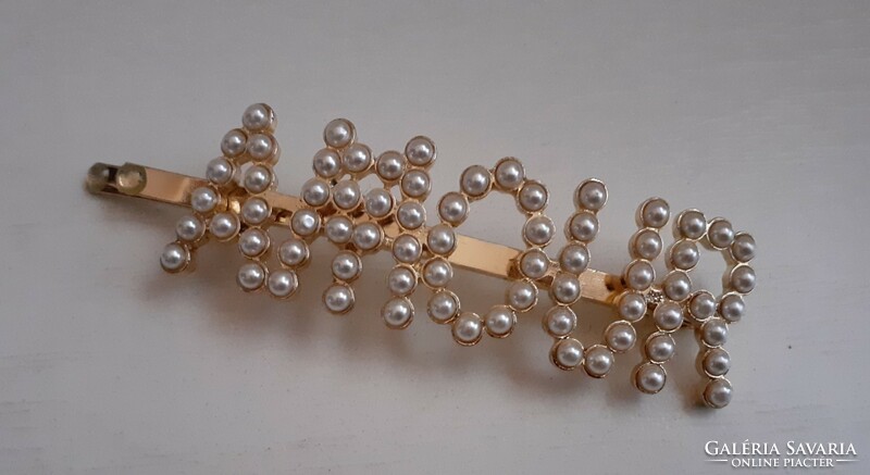 Gold-plated metal hair clip in good condition, studded with tekla pearls