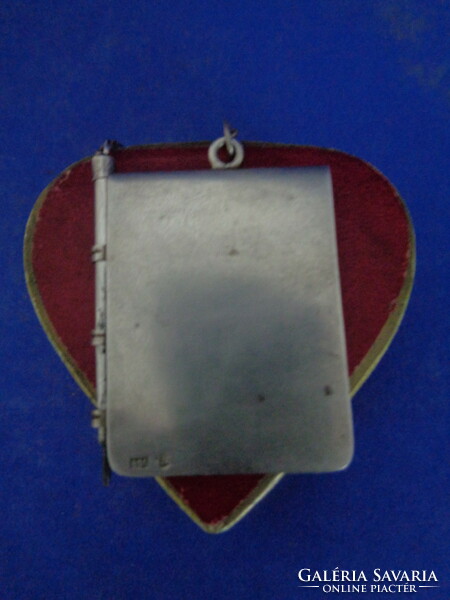 1940 Silver notebook with pencil