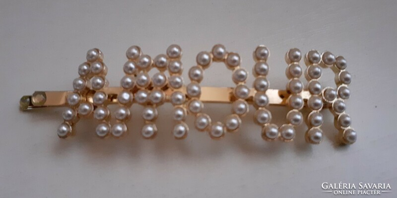 Gold-plated metal hair clip in good condition, studded with tekla pearls