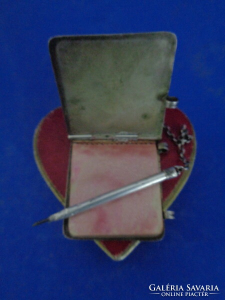1940 Silver notebook with pencil