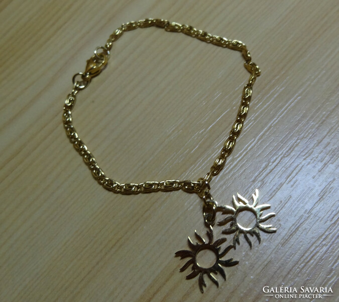 S - pancher medical steel bracelet with 2 cute sunburst pendants, the pendant runs on the chain, not fixed.