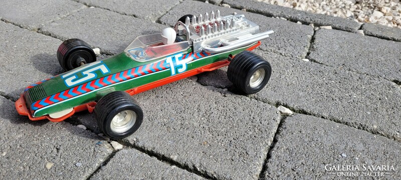 Disc game formula 1 flywheel racing car.