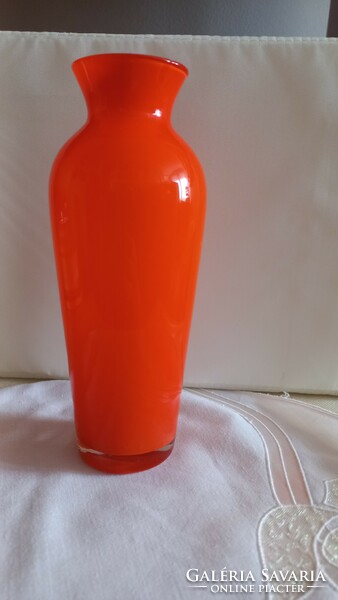 Orange colored, two-layer, blown glass vase