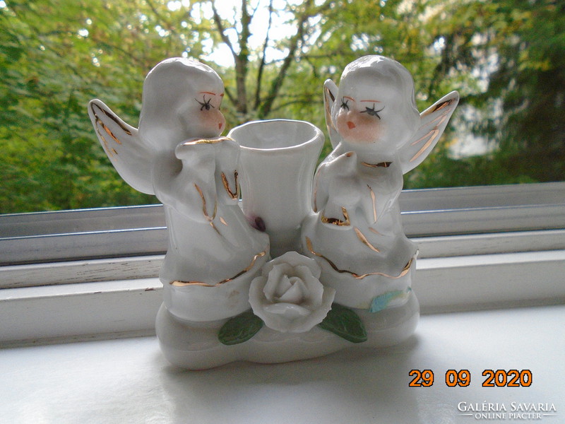 Hand-made, hand-painted candle holders with two musical angels