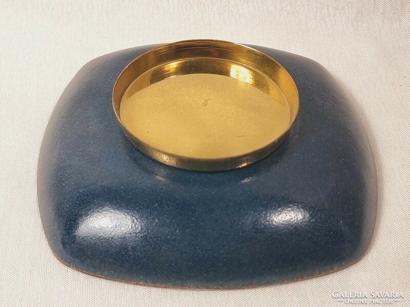 Rainbow-colored fire enamel bowl made of copper material. There is a fish mark on the sole