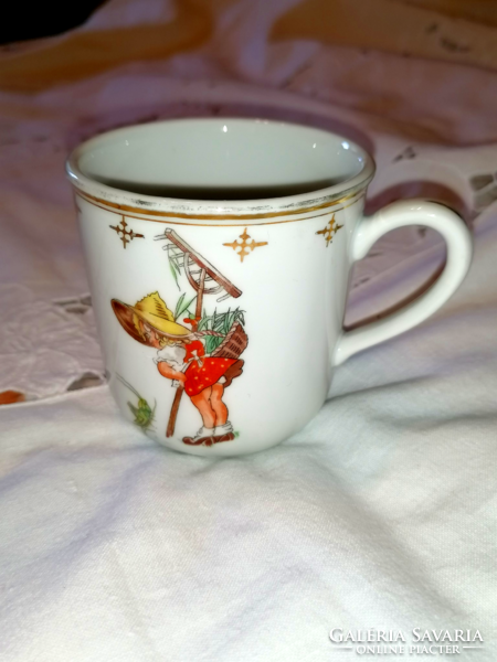 Porcelain meses cup, with a grasshopper fairy pattern that is also found on rare Zsolnay cups