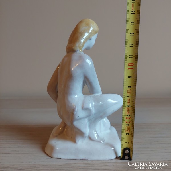 Antique ceramic female nude figure with a jug