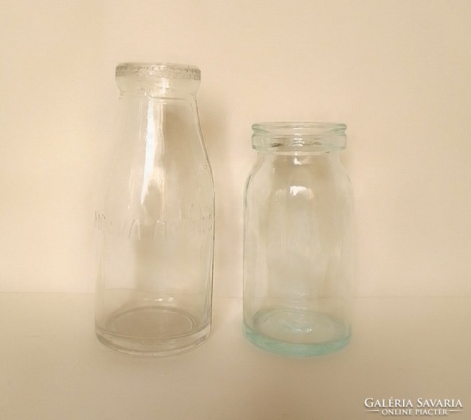 Two small old molded milk bottles, 0.25 and 0.2 l, 'to be returned after washing'