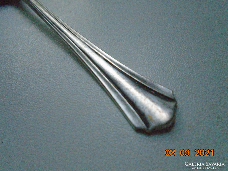 Antique silver-plated teaspoon with several markings