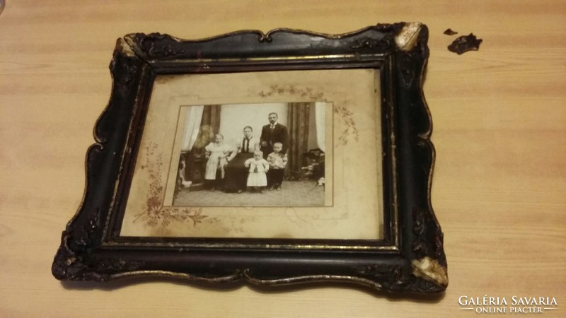 Old family photo from 1913 in wooden frame