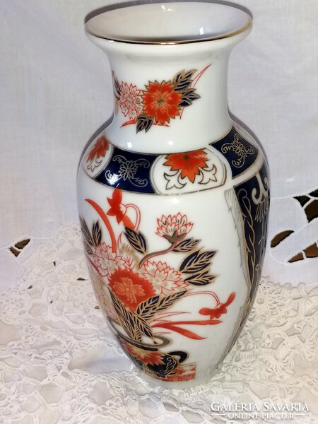 Vintage Imari porcelain, Japanese bay vase, with characteristic red flowers