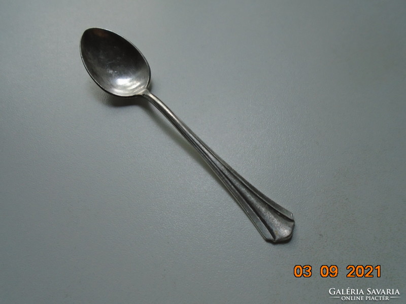 Antique silver-plated teaspoon with several markings