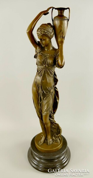 Women carrying water - bronze statue