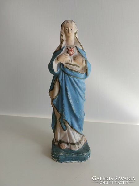 Old religious figure gypsum heart of Mary statue