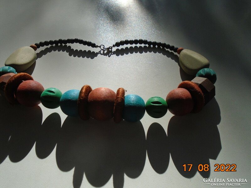 Large necklace of painted wooden beads of different shapes and colors