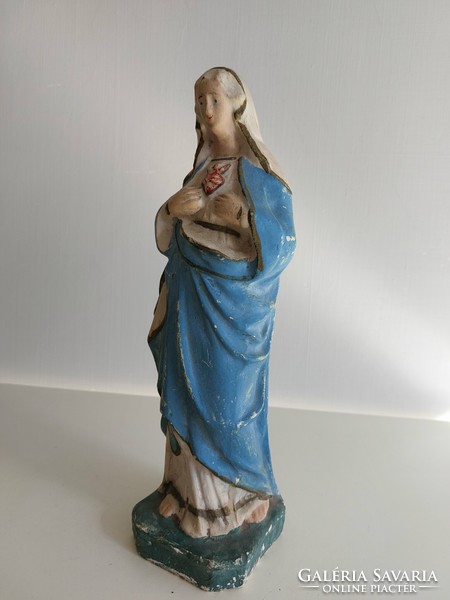 Old religious figure gypsum heart of Mary statue