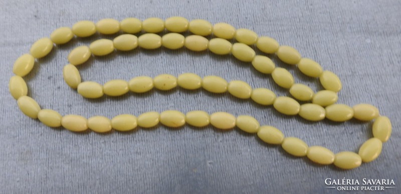 Greenish-yellow string of pearls