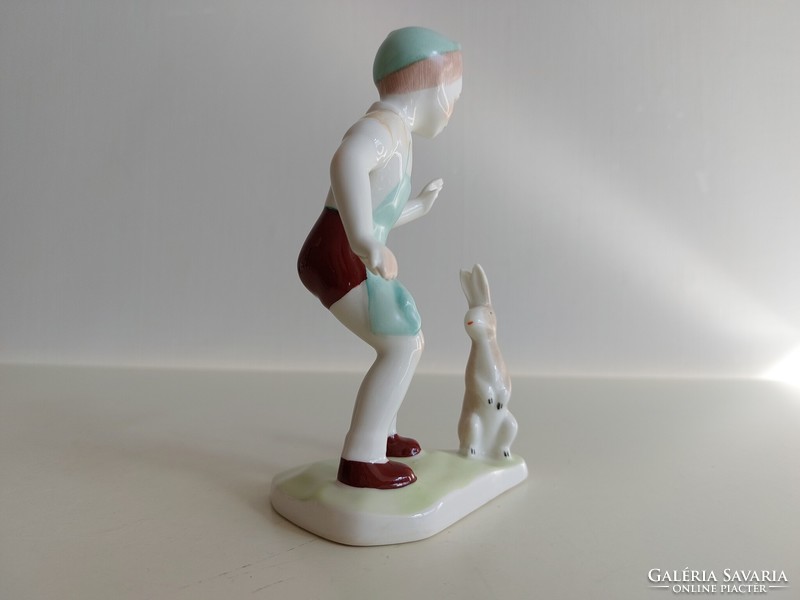 Old aquincum Budapest porcelain figurine of a boy with a bunny