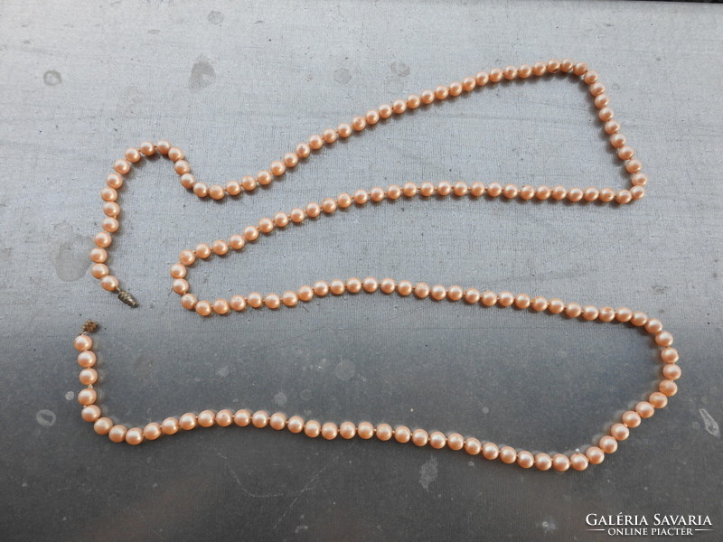 Antique butter colored string of pearls